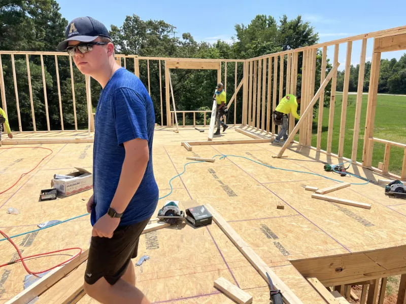 A custom home framing the second level.