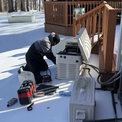 Upchurch technician is working on a generator service call during an ice outage.