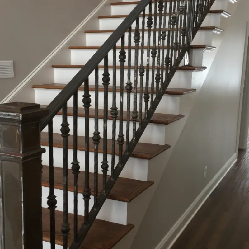 Staircase with iron rails.