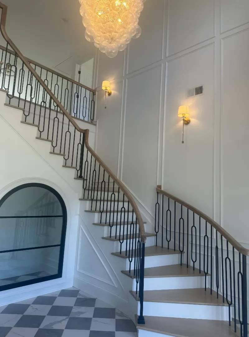 Full view of a beautiful staircase with modern railing.